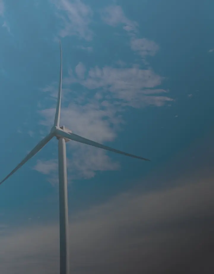 Single offshore wind turbine against a blue sky
